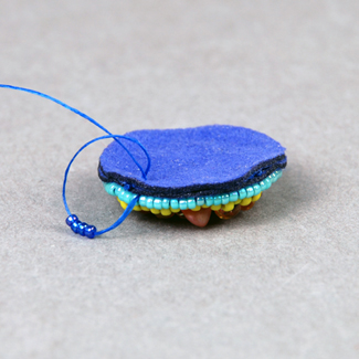 Close up of edging stitch in bead embroidery